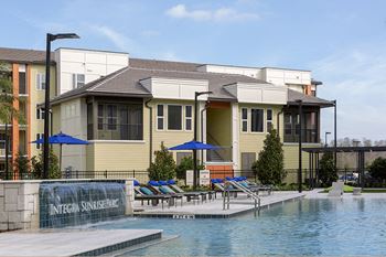 Swimming pool with relaxing sundecks